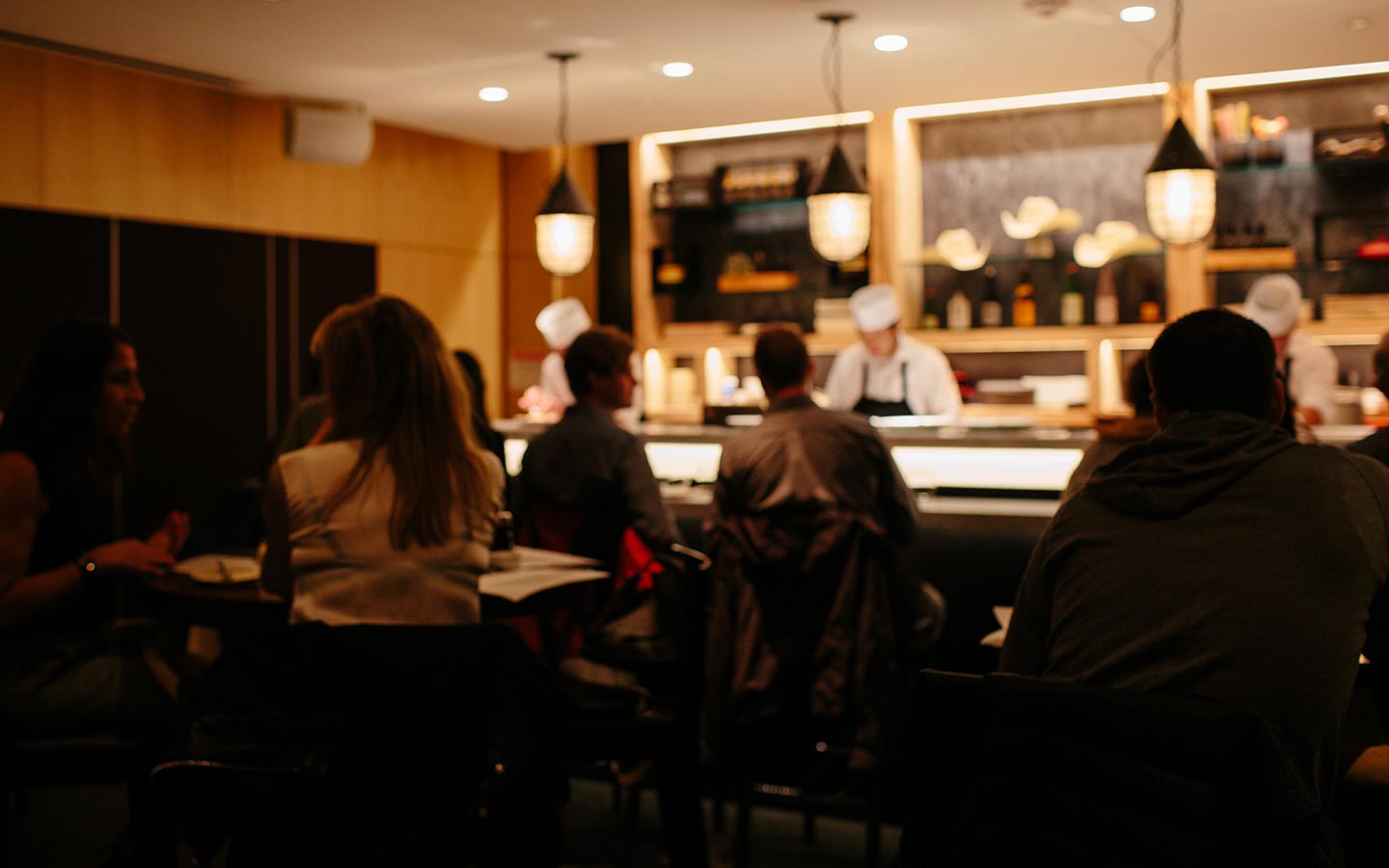 Photo of Chef Naoki at the bar